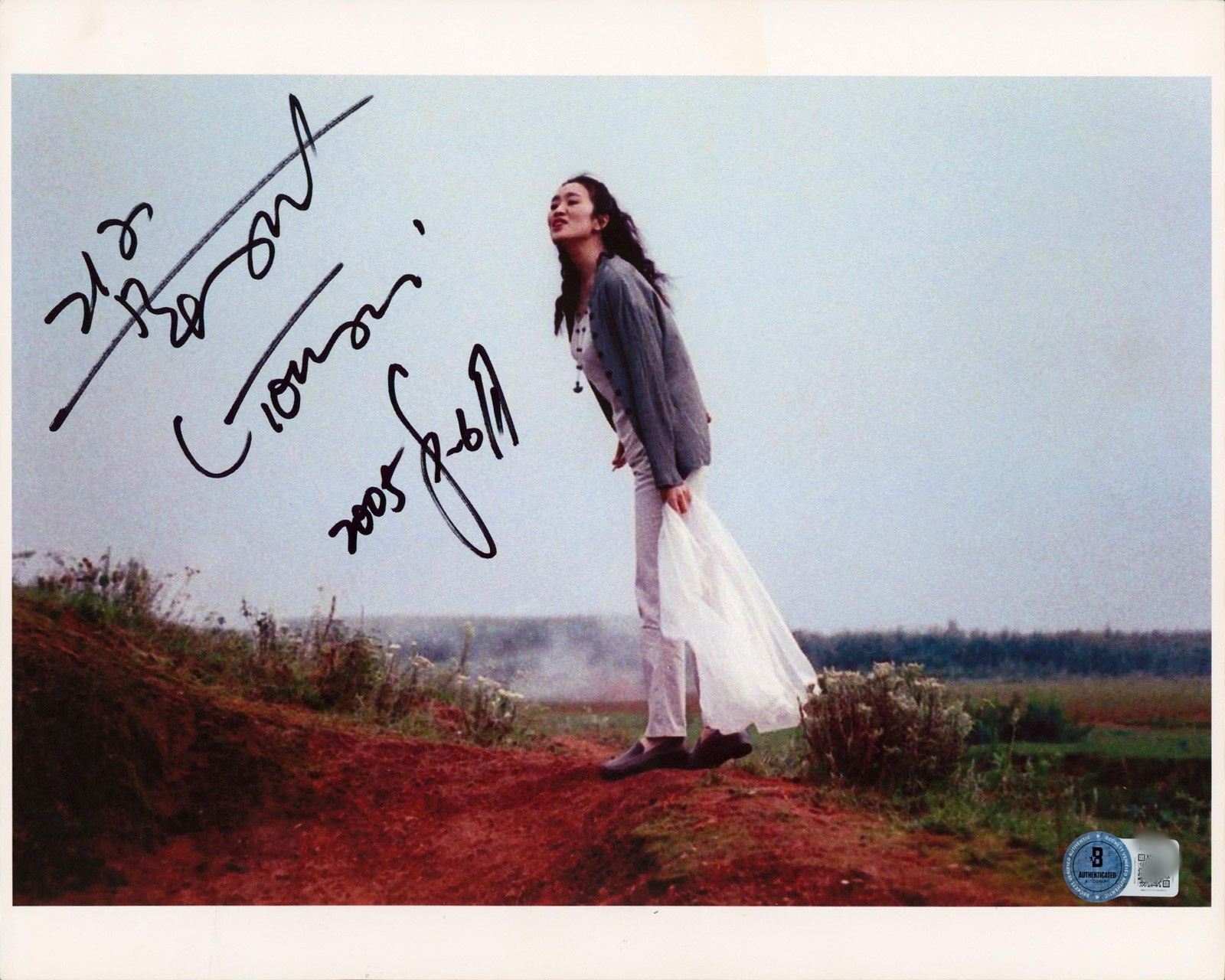 Authentic Gong Li signed Zhou Yu's Train photo autograph verified by Beckett Authentication Services BAS.