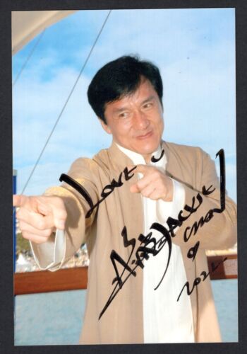 Authentic Jackie Chan signed photo autograph, obtained from a senior private collection.